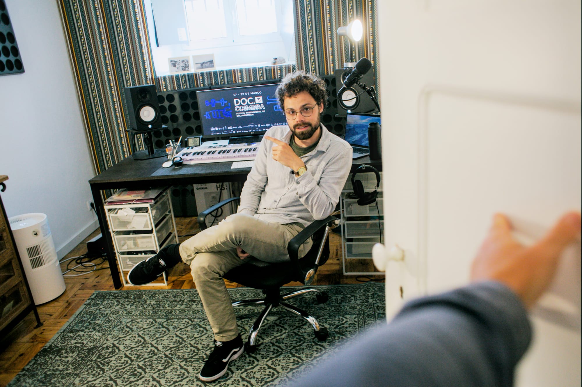 Leandro sitting in his studio